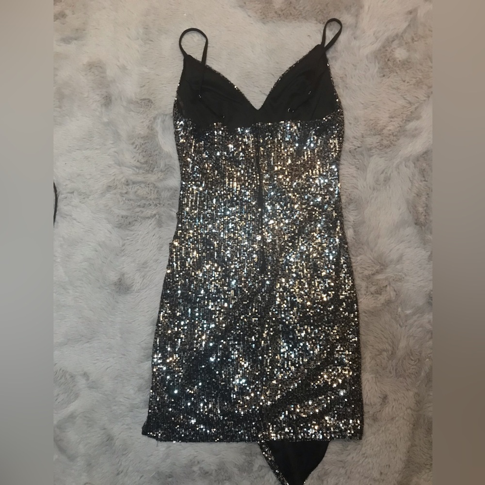 Size M, color black with silver sequins